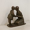 theo megaw the kiss bronze side
